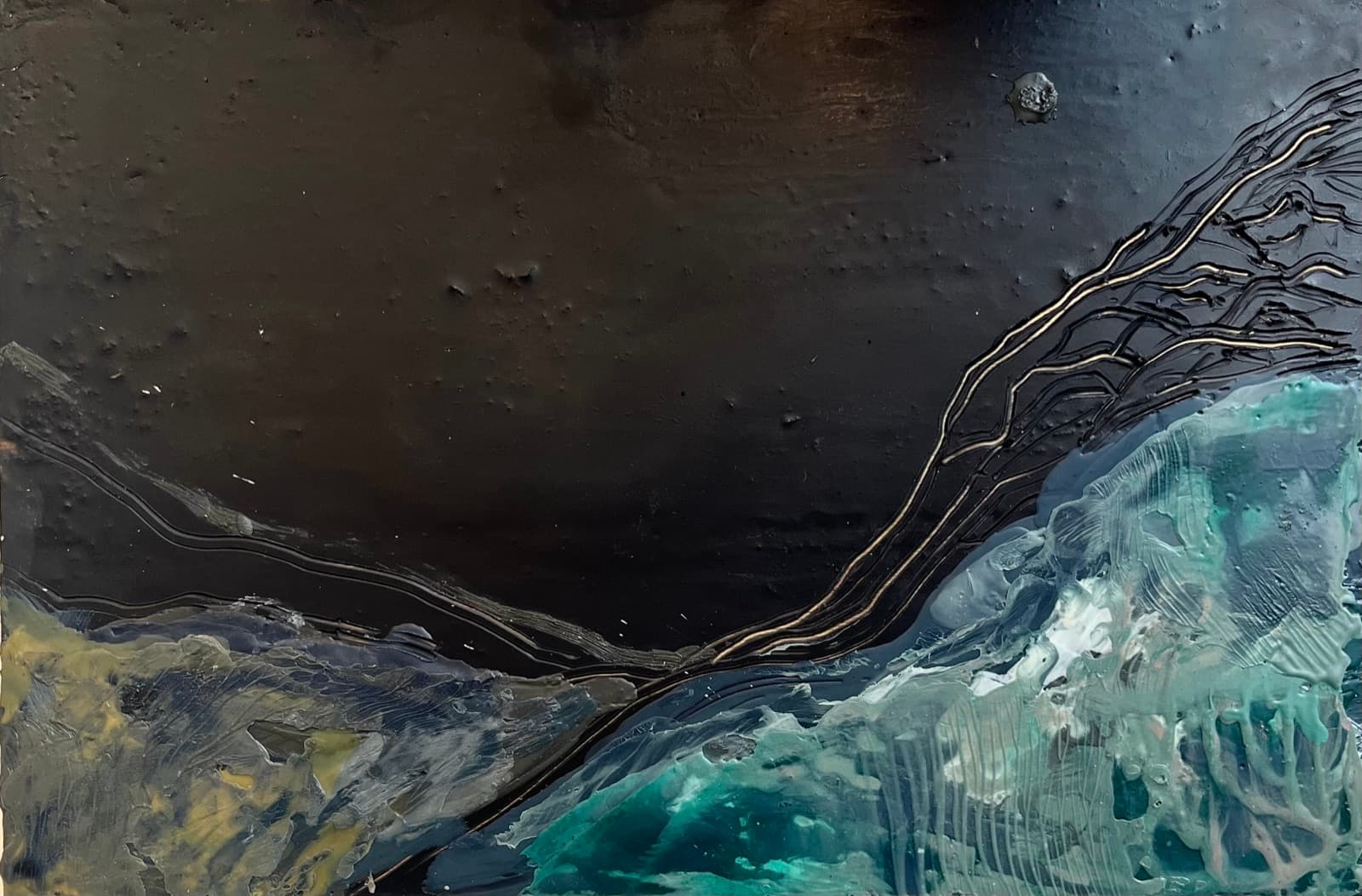 Resin abstract painting of a dark coastline with branching light and teal waves