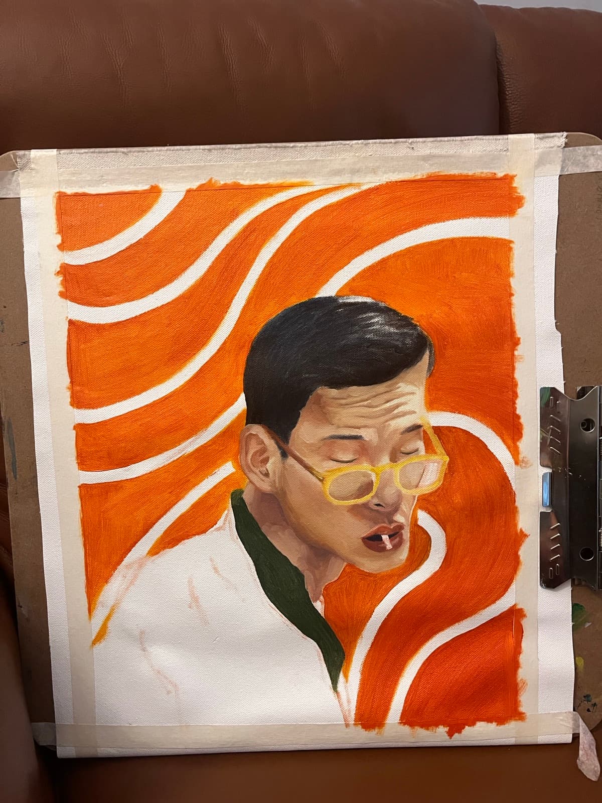 Work-in-progress oil portrait with orange and white swirling stripes
